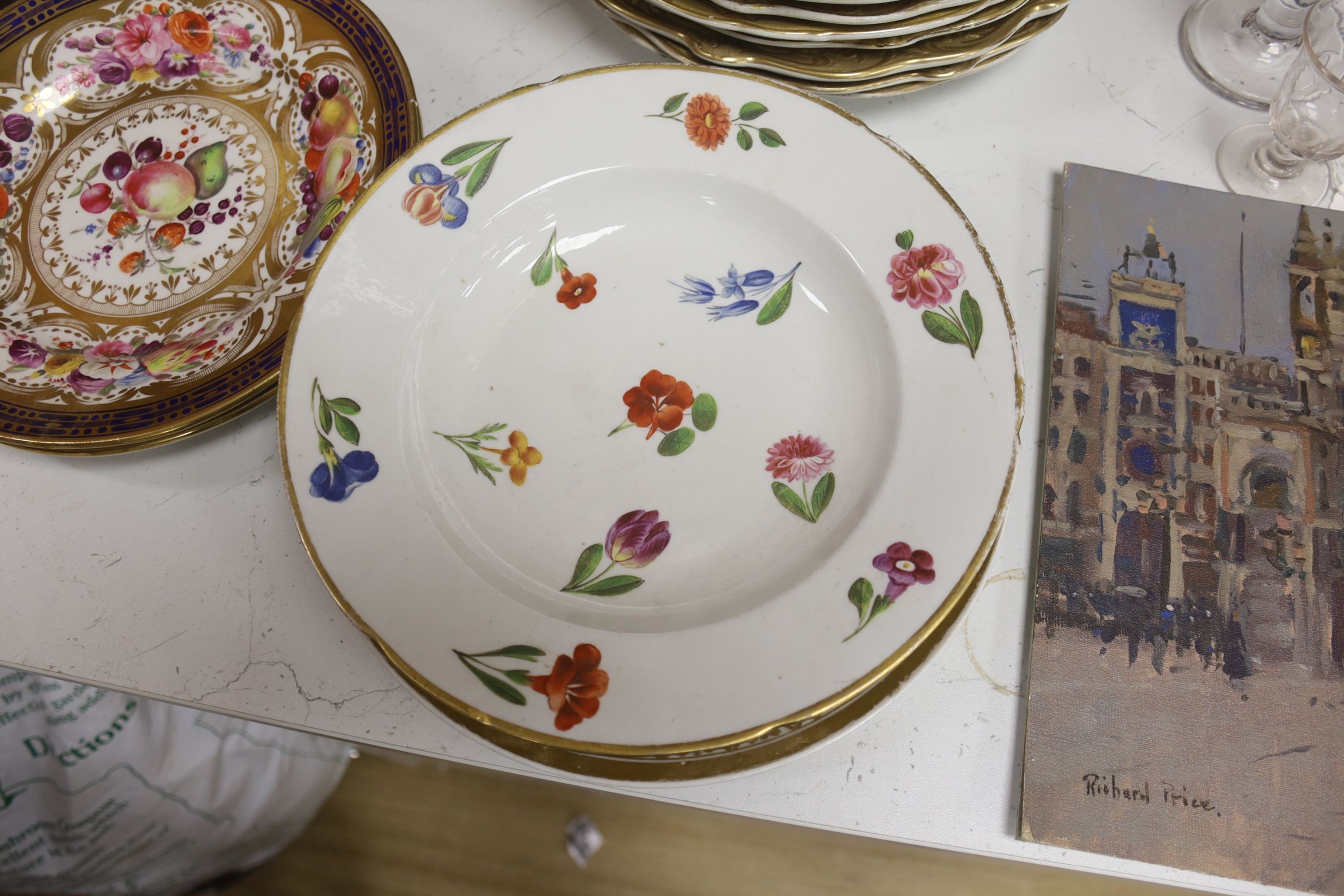 A collection of eight F & R Pratt landscape plates and six 19th-century porcelain plates